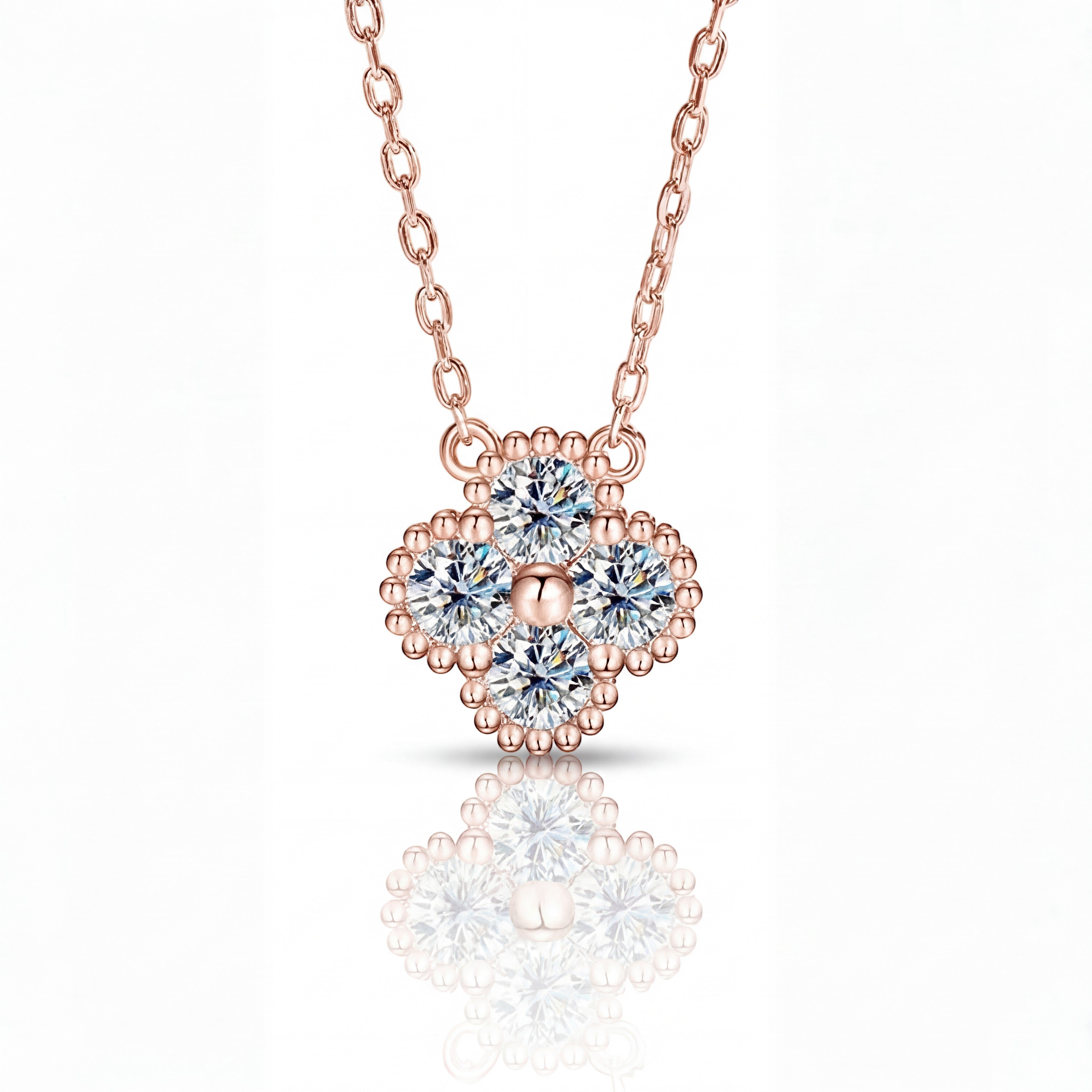 Aureline Fleur de Lumière necklace featuring a flower-shaped pendant with white lab-grown gems in rose gold vermeil.