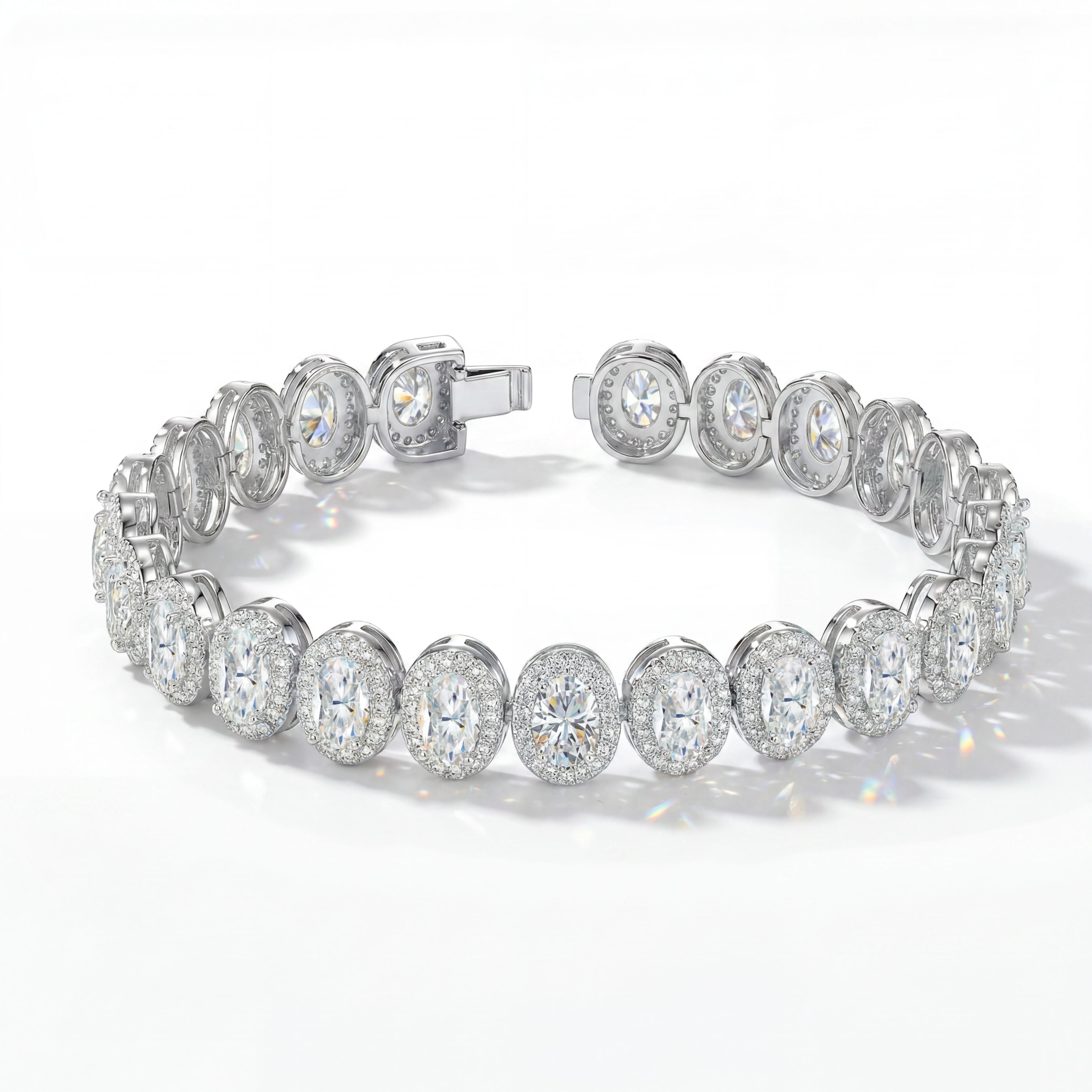 Aureline Halo Tennis Bracelet featuring oval-cut lab-grown gems in a sterling silver 18K white gold vermeil setting.